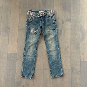 Washed Low-Rise Jeans with Floral Details